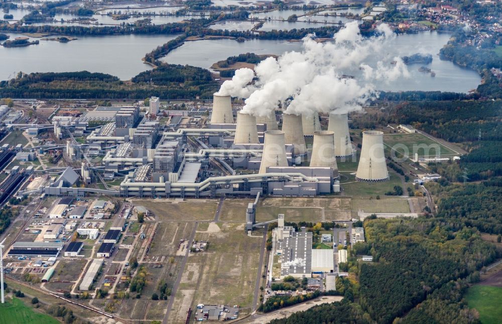 Aerial photograph Teichland - Clouds of exhaust gas in the cooling towers of the power plant Jaenschwalde, a lignite-fired thermal power plant in southeastern Brandenburg. Power plant operator is to Vattenfall Europe belonging Vattenfall Europe Generation AG, which emerged from VEAG