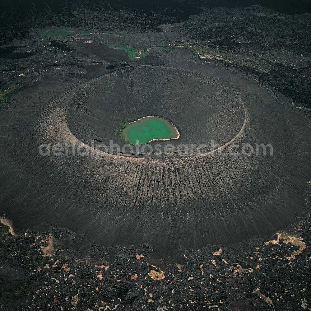 Danakil Wüste from above - Desert landscape with volcano in the Danakil desert, Afar, Ethiopia. Water collected in the crater after one of the very seldom rainfalls in this area. It evaporates in the course of time