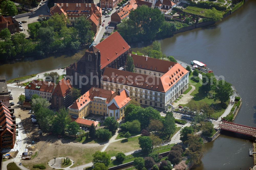 Wroclaw - Breslau from above - Island Wyspa Piasek with the University Library, a former Augustinian monastery, the Sand Church of St. Mary and the Orthodox Church of St. Cyril and Methodius on the bank of the Oder river on the Swietej Jadwigi road in Wroclaw - Breslau in Lower Silesian Voivodeship, Poland