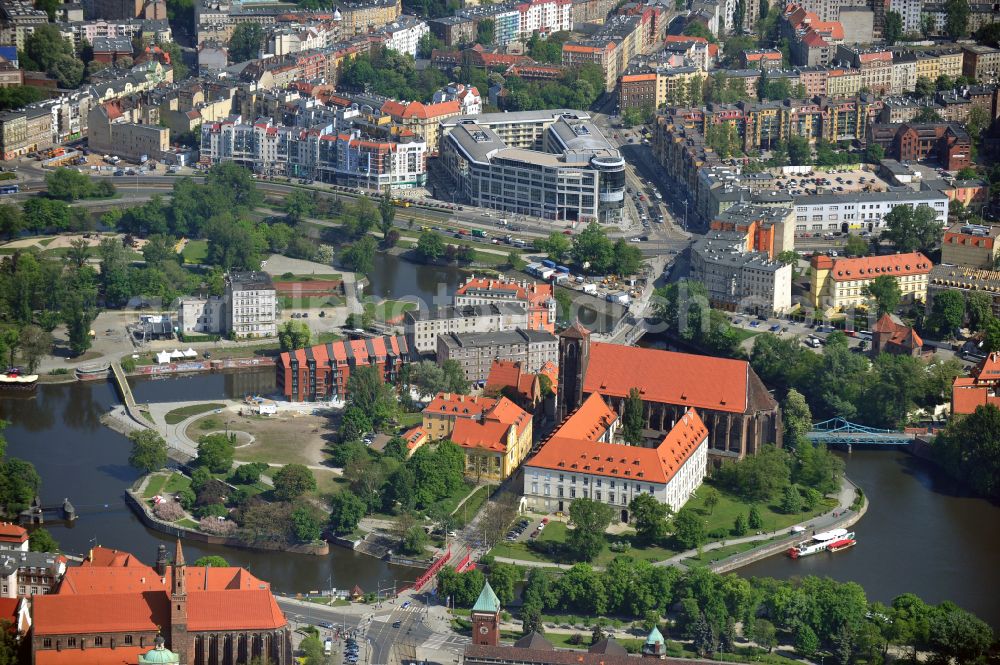 Aerial image Wroclaw - Breslau - Island Wyspa Piasek with the University Library, a former Augustinian monastery, the Sand Church of St. Mary and the Orthodox Church of St. Cyril and Methodius on the bank of the Oder river on the Swietej Jadwigi road in Wroclaw - Breslau in Lower Silesian Voivodeship, Poland