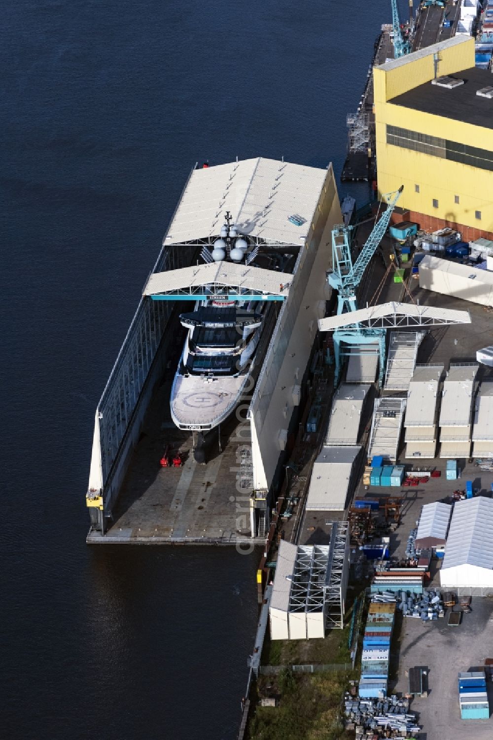 Bremen from the bird's eye view: Luxury yacht Opus in of Luerssen Werft on the water surface in in Bremen, Germany