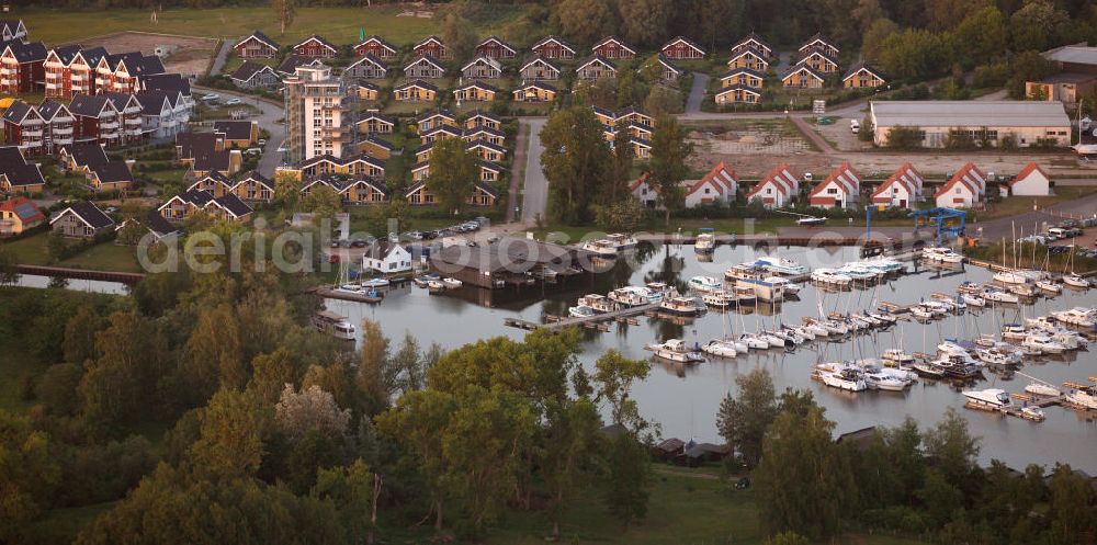 RECHLIN from the bird's eye view: Marina at the Claassee in Rechlin, Mecklenburg-Western Pomerania. The marina is part of the harbor village of Rechlin North and has direct access to the Müritz through a channel