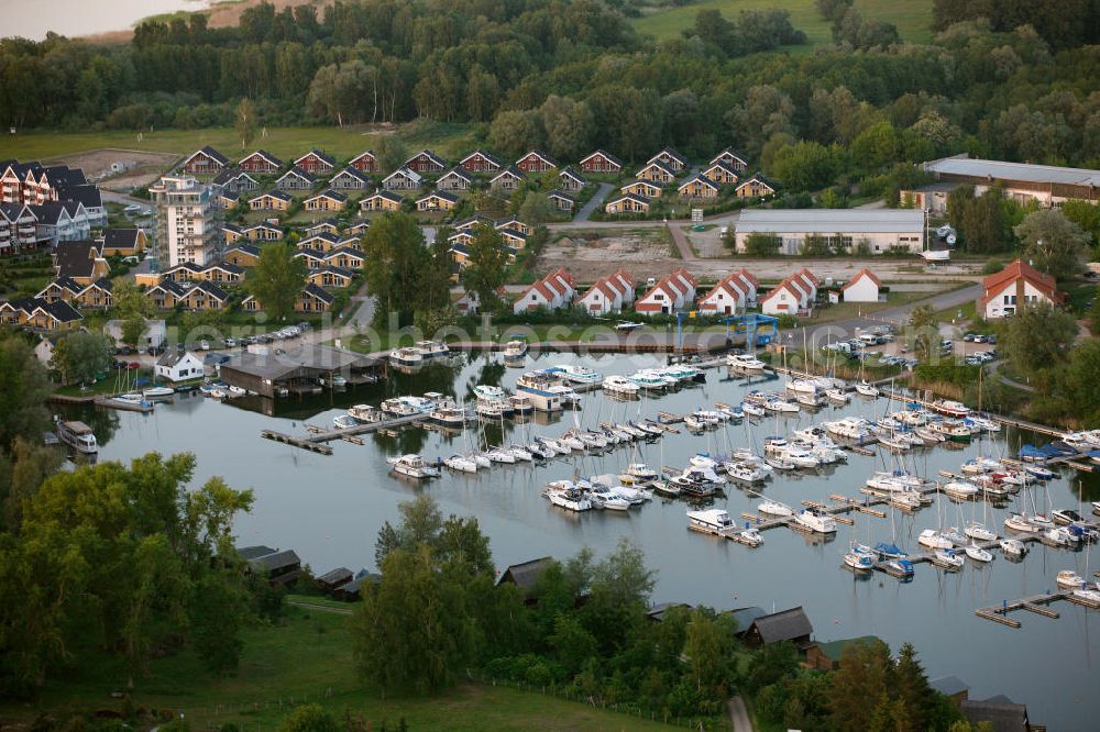 RECHLIN from the bird's eye view: Marina at the Claassee in Rechlin, Mecklenburg-Western Pomerania. The marina is part of the harbor village of Rechlin North and has direct access to the Müritz through a channel