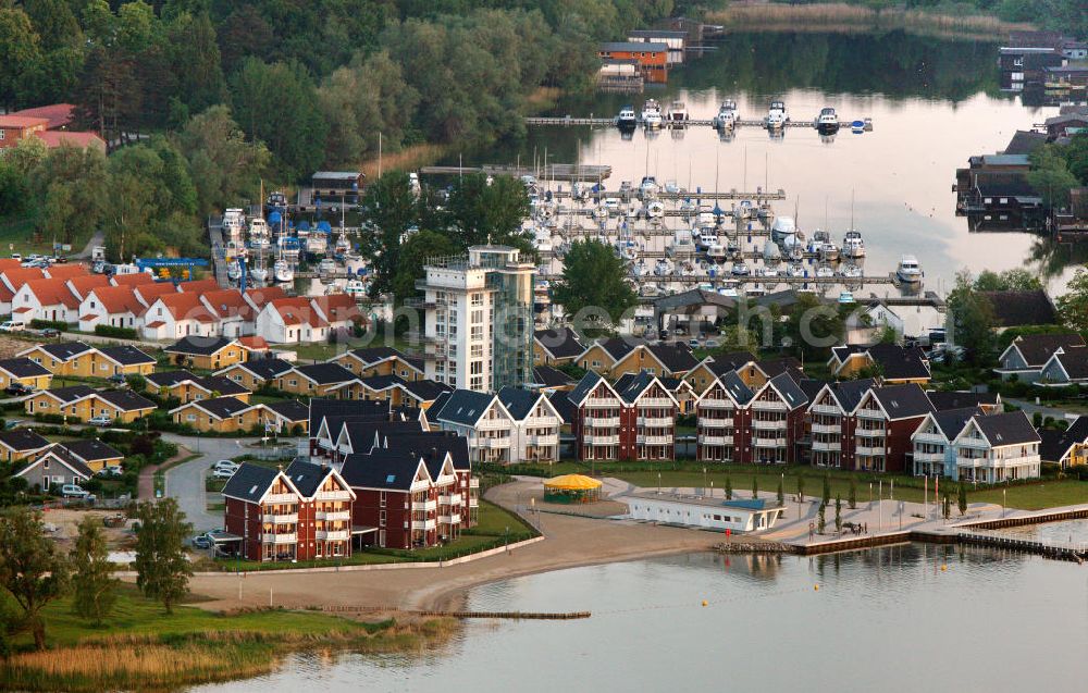 RECHLIN from the bird's eye view: Marina at the Claassee in Rechlin, Mecklenburg-Western Pomerania. The marina is part of the harbor village of Rechlin North and has direct access to the Müritz through a channel