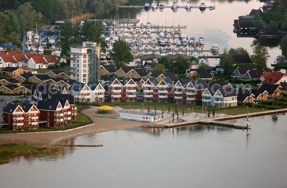 Aerial image RECHLIN - Marina at the Claassee in Rechlin, Mecklenburg-Western Pomerania. The marina is part of the harbor village of Rechlin North and has direct access to the Müritz through a channel