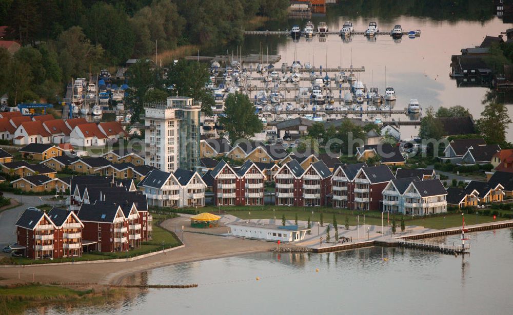 Aerial photograph RECHLIN - Marina at the Claassee in Rechlin, Mecklenburg-Western Pomerania. The marina is part of the harbor village of Rechlin North and has direct access to the Müritz through a channel