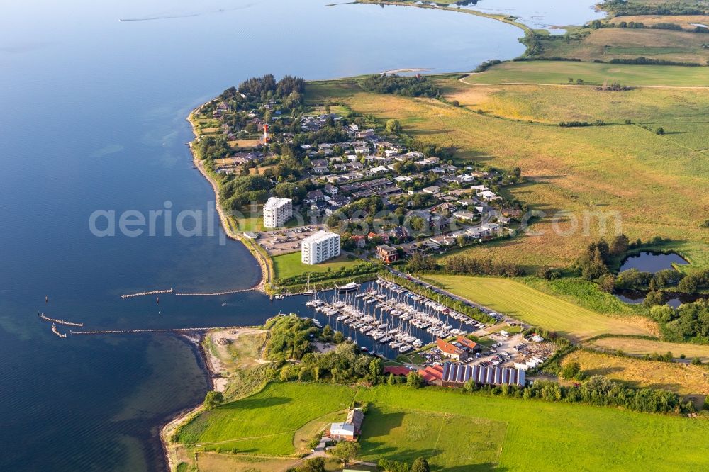 Aerial photograph Glücksburg - Pleasure boat marina of CLUB NAUTIC e.V. with docks and moorings on the shore area of the Foerde with Restaurant Leuchtturm in Schausende in Gluecksburg in the state Schleswig-Holstein, Germany