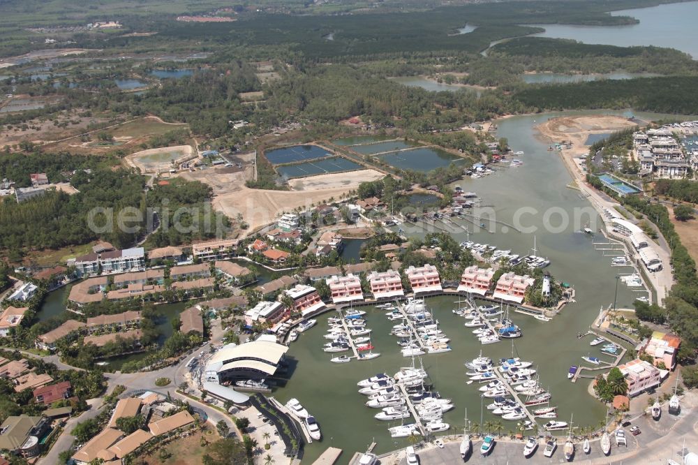 Aerial image Koh Keaw - In Koh Kaew at Chuan Chuen Village on the island of Phuket a fashionable marina for sport boats and yachts has been developed with luxury resorts and hotels, the Phuket Boat Lagoon, also known as Royal Phuket Marina in Thailand