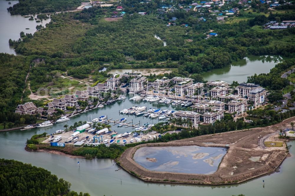 Aerial photograph Tambon Ko Kaeo - In Koh Kaew at Chuan Chuen Village on the island of Phuket a fashionable marina for sport boats and yachts has been developed with luxury resorts and hotels, the Phuket Boat Lagoon, also known as Royal Phuket Marina in Thailand