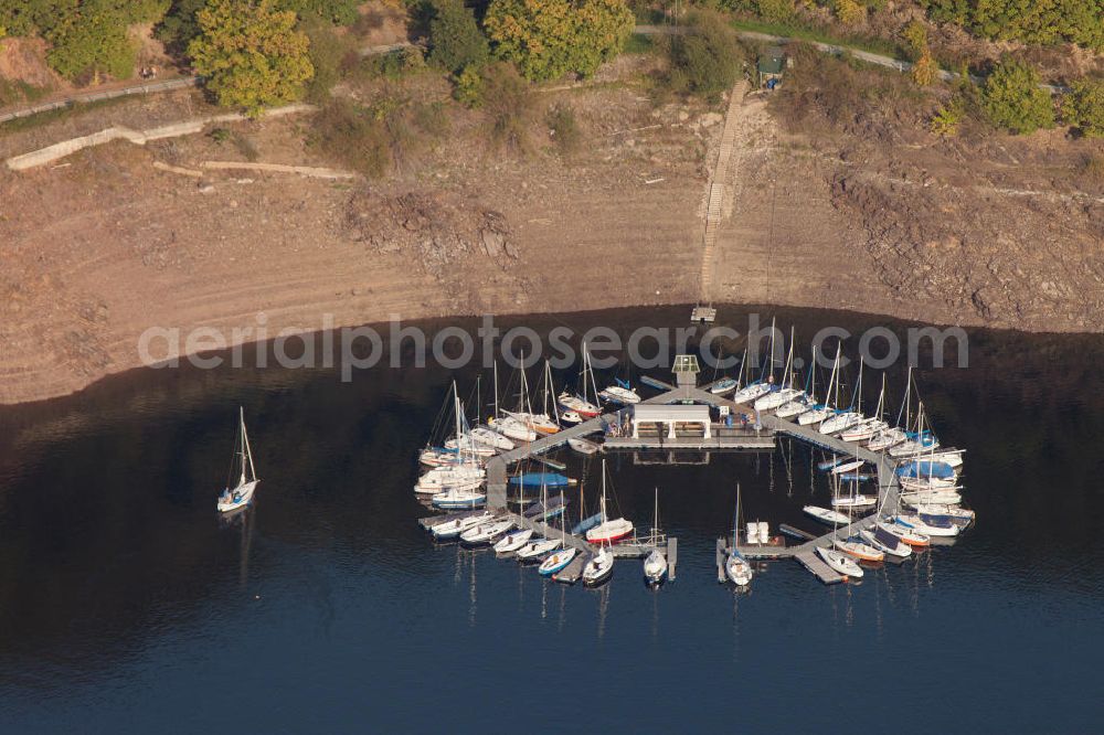 HEIMBACH from above - Marina at the Rurstausee near Heimbach in North Rhine-Westphalia. The Rurstausee was dammed by the Rurtalsperre Schwammenauel and is the second largest reservoir in Germany. The dam is situated in the Eifel National Park