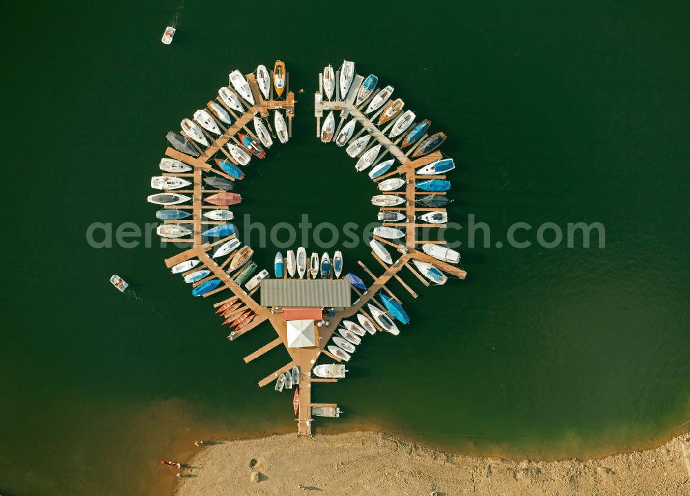 HEIMBACH from the bird's eye view: Marina at the Rurstausee near Heimbach in North Rhine-Westphalia. The Rurstausee was dammed by the Rurtalsperre Schwammenauel and is the second largest reservoir in Germany. The dam is situated in the Eifel National Park