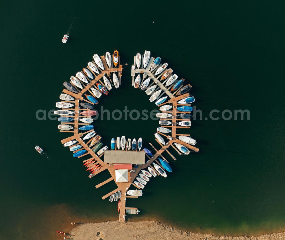 Aerial photograph HEIMBACH - Marina at the Rurstausee near Heimbach in North Rhine-Westphalia. The Rurstausee was dammed by the Rurtalsperre Schwammenauel and is the second largest reservoir in Germany. The dam is situated in the Eifel National Park