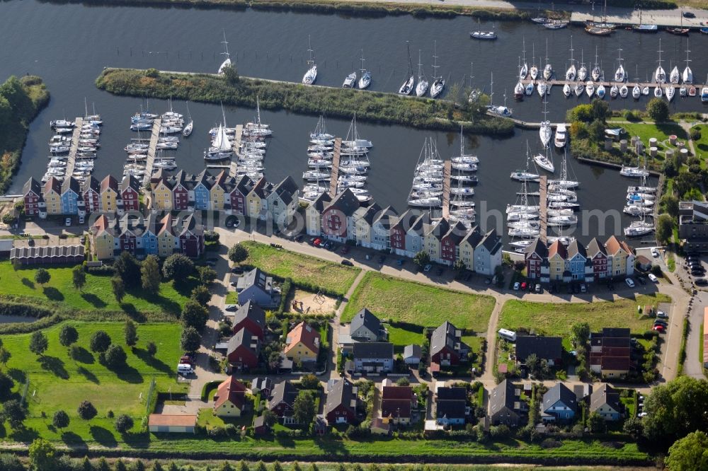 Greifswald from the bird's eye view: Pleasure boat marina with docks and moorings on the shore area in Greifswald in the state Mecklenburg - Western Pomerania, Germany