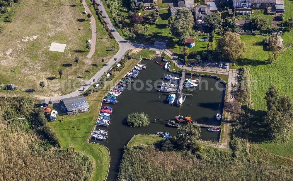 Aerial image Loddin - Pleasure boat marina with docks and moorings on the shore area Achterwasser in Koserow in the state Mecklenburg - Western Pomerania