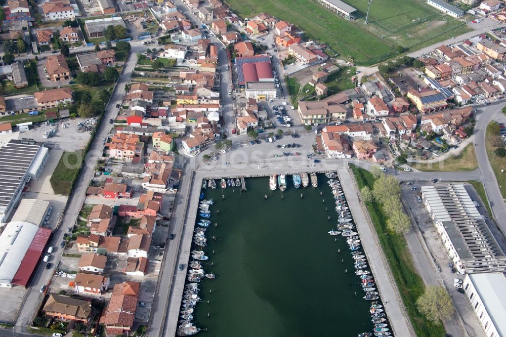 Goro from the bird's eye view: Pleasure boat marina with docks and moorings on the shore area der Adria in Goro in Emilia-Romagna, Italy