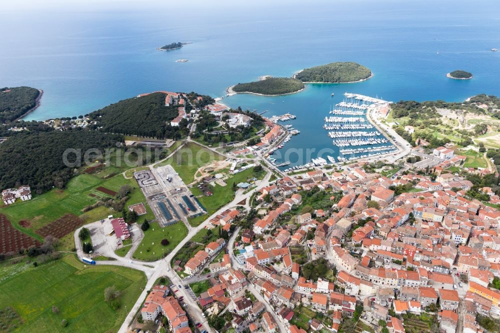 Aerial image Vrsar - Pleasure boat marina with docks and moorings on the shore area of the Adriatic sea in Vrsar in Istirien - Istarska zupanija, Croatia