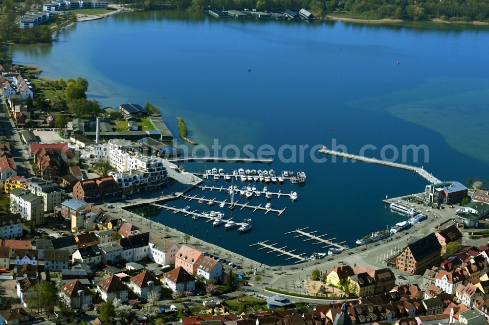 Aerial image Waren (Müritz) - Pleasure boat marina with docks and moorings on the shore area of Binnenmueritz in Waren (Mueritz) in the state Mecklenburg - Western Pomerania, Germany