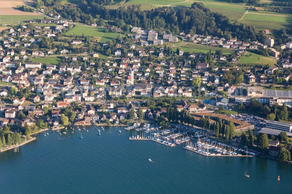 Aerial image Steckborn - Pleasure boat marina with docks and moorings on the shore area of Lake of Constance in Steckborn in the canton Thurgau, Switzerland