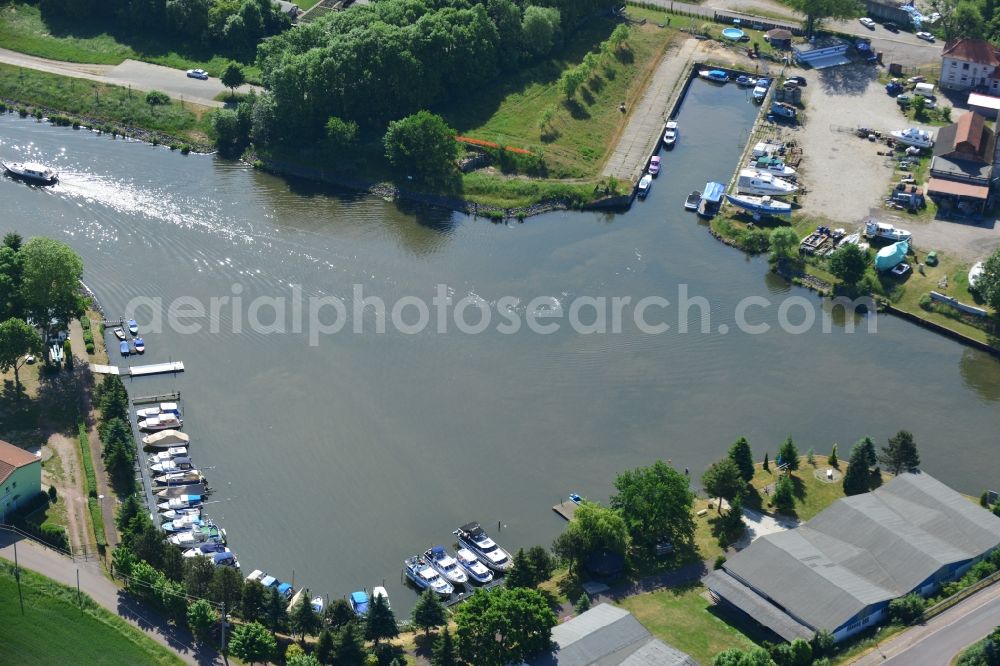 Burg (bei Magdeburg) from above - Pleasure boat marina with docks and moorings on the shore area in Burg (bei Magdeburg) in the state Saxony-Anhalt