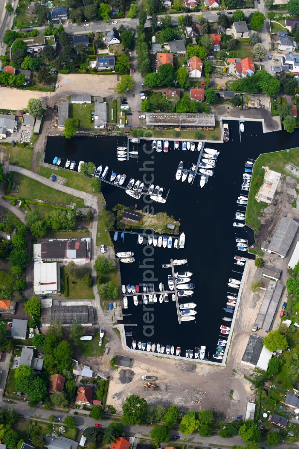 Aerial image Berlin - Pleasure boat marina with docks and moorings on the shore area the Dahme in Berlin, Germany