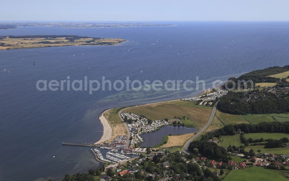 Langballig from the bird's eye view: Pleasure boat marina with docks and moorings on the shore area in Langballig in the state Schleswig-Holstein