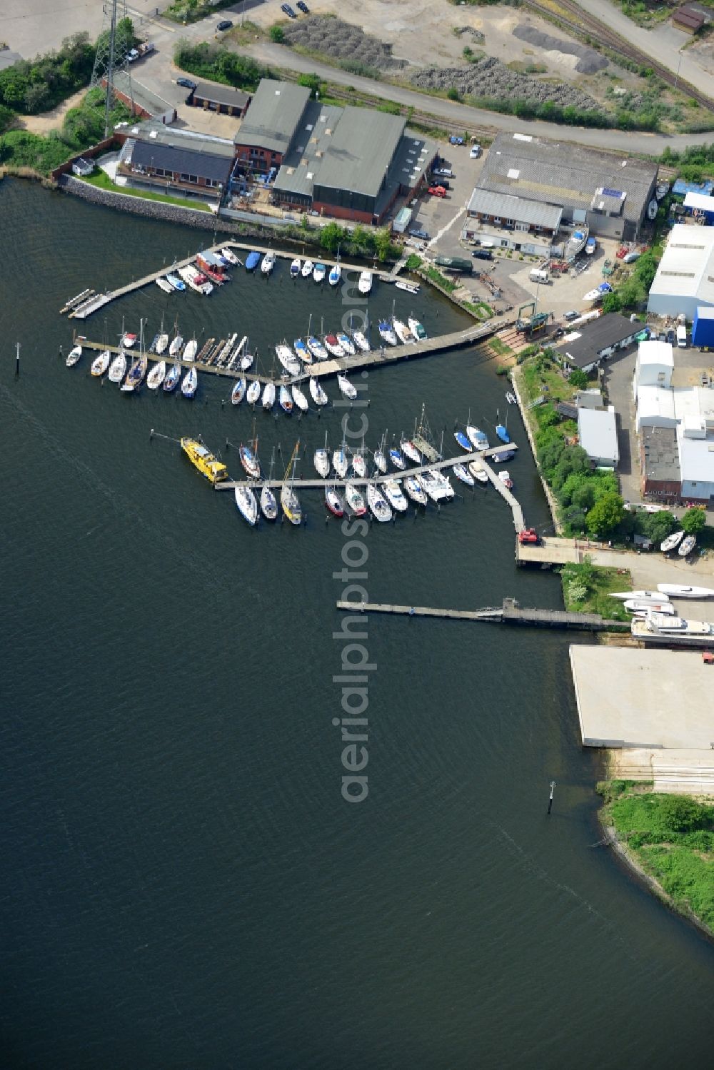 Aerial image Lübeck - Pleasure boat marina with docks and moorings on the shore area in Luebeck in the state Schleswig-Holstein