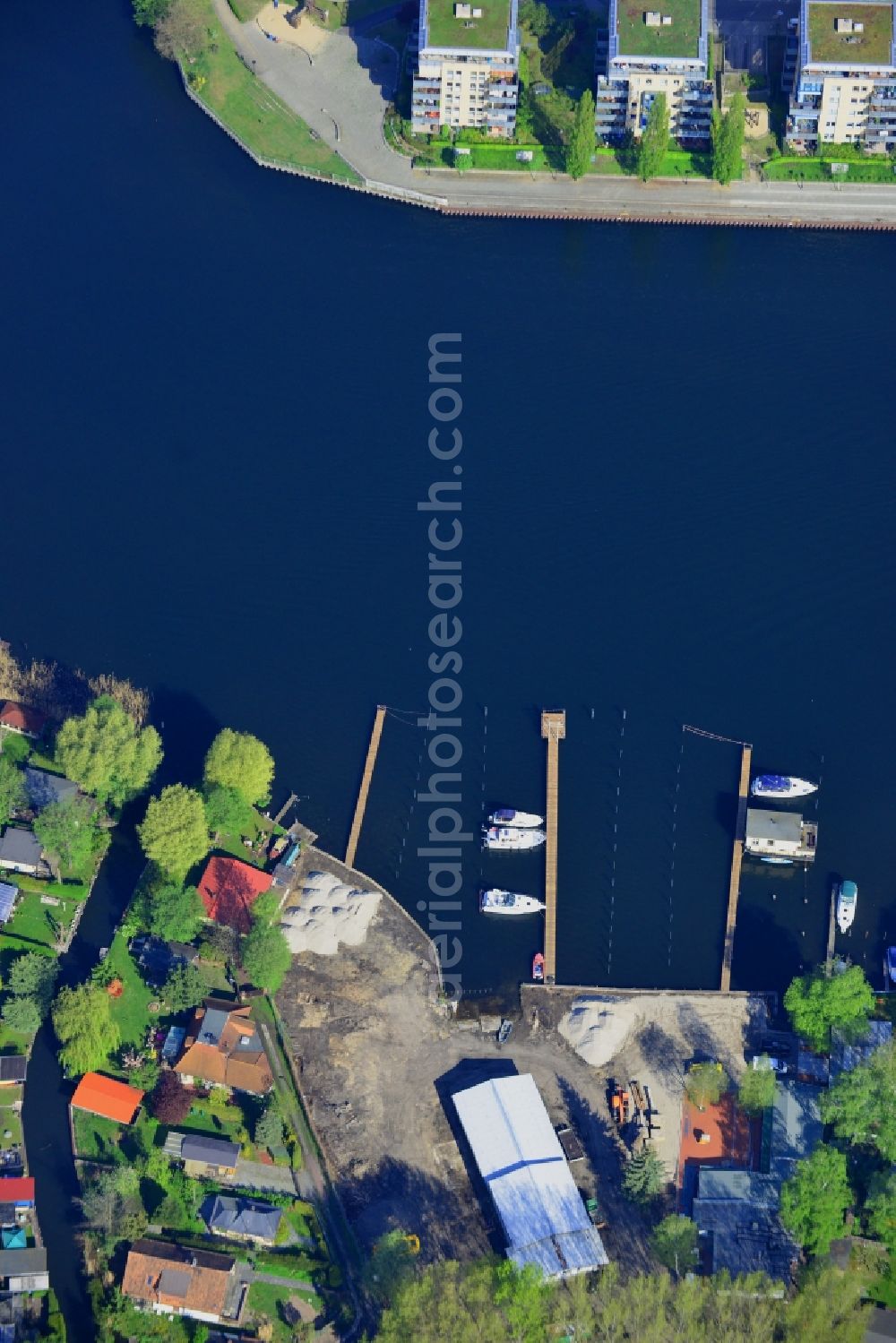 Berlin from the bird's eye view: Pleasure boat marina with docks and moorings on the shore area in Berlin in Germany