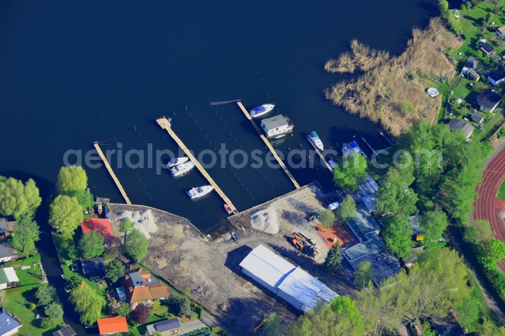 Berlin from above - Pleasure boat marina with docks and moorings on the shore area in Berlin in Germany