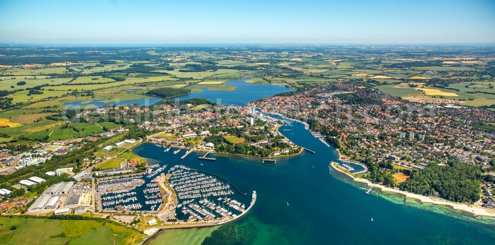 Neustadt in Holstein from the bird's eye view: Pleasure boat marina with docks and moorings on the shore area in Neustadt in Holstein in the state Schleswig-Holstein