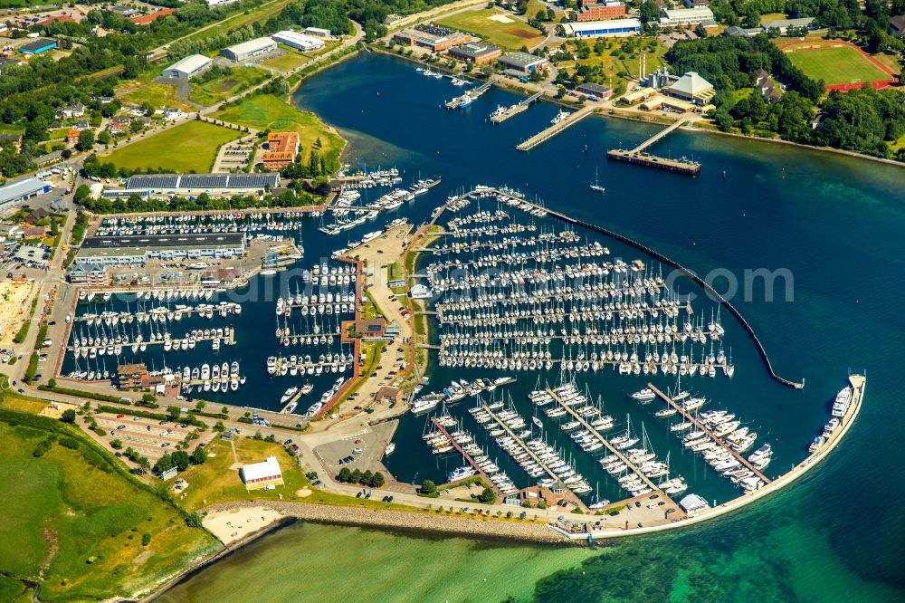 Aerial photograph Neustadt in Holstein - Pleasure boat marina with docks and moorings on the shore area in Neustadt in Holstein in the state Schleswig-Holstein