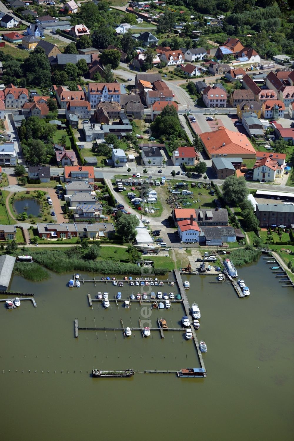 Neustrelitz from above - Pleasure boat marina with docks and moorings on the shore area in Neustrelitz in the state Mecklenburg - Western Pomerania