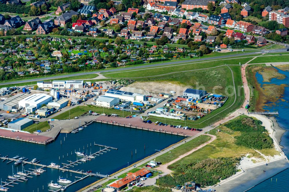 Aerial image Norderney - Pleasure boat marina with docks and moorings on the shore area in Norderney in the state Lower Saxony, Germany