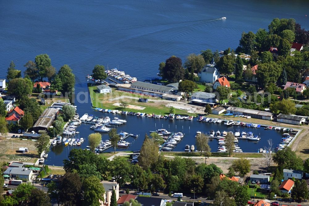 Berlin from above - Pleasure boat marina with docks and moorings on the shore area on Dahme in the district Schmoeckwitz in Berlin, Germany