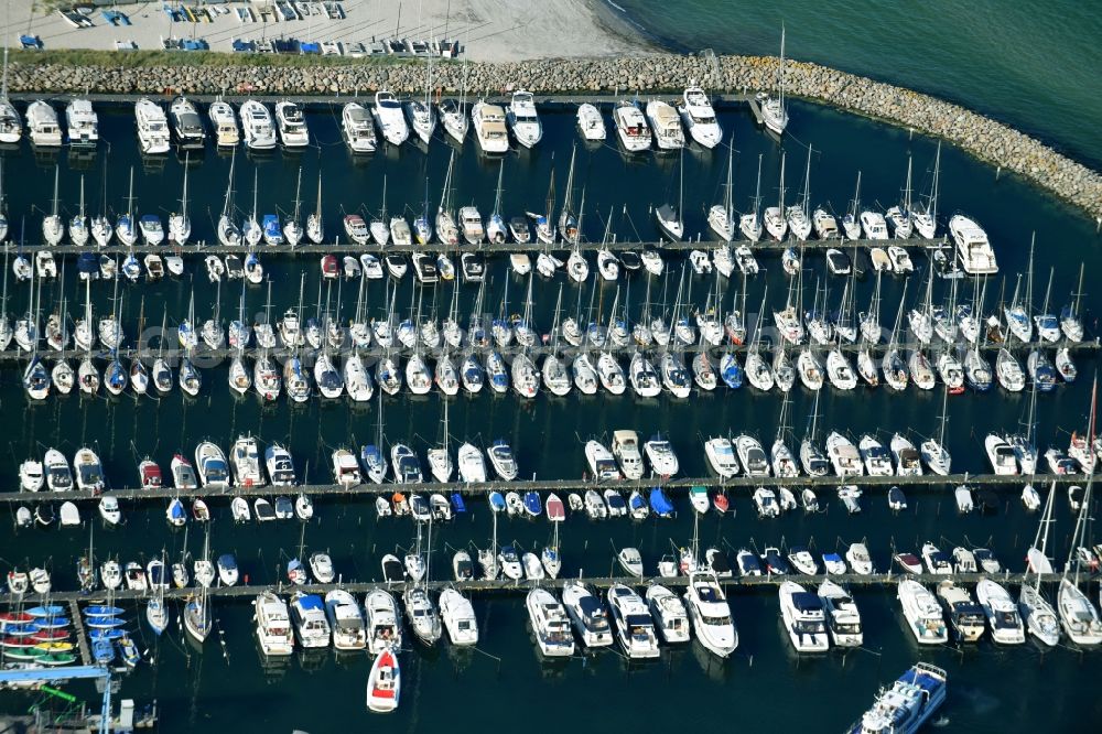 Grömitz from above - Pleasure boat marina with docks and moorings on the shore area the Baltic Sea in Groemitz in the state Schleswig-Holstein, Germany