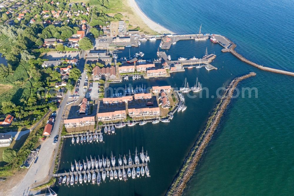 Aerial image Klintholm Havn - Pleasure boat marina with docks and moorings on the shore area of Baltic Sea in Klintholm Havn in Region Sjaelland, Denmark