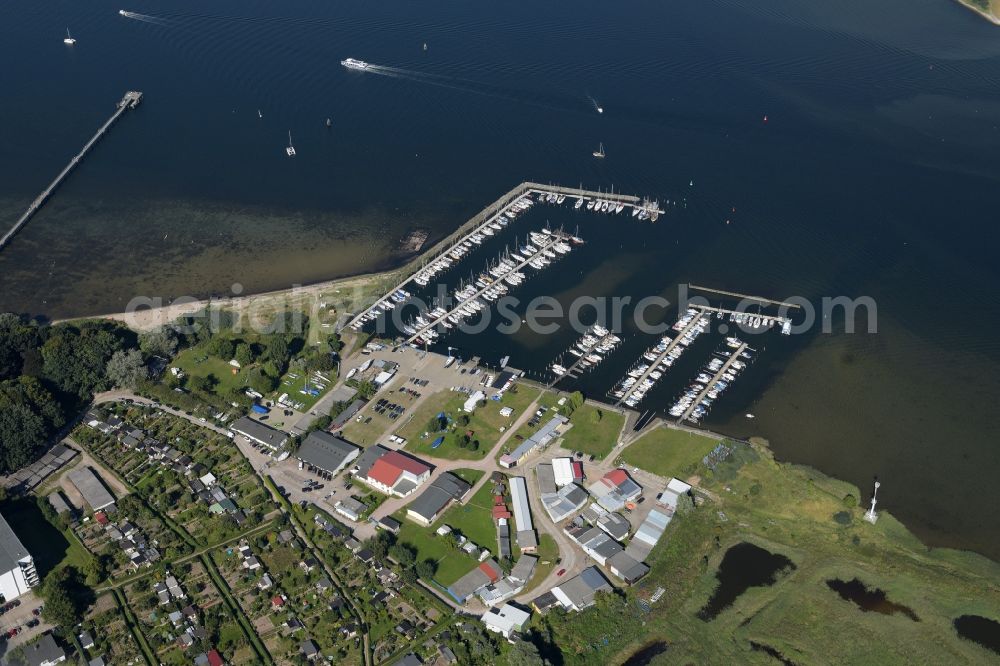 Wismar from above - Pleasure boat marina with docks and moorings on the shore area the Baltic Sea in Wismar in the state Mecklenburg - Western Pomerania