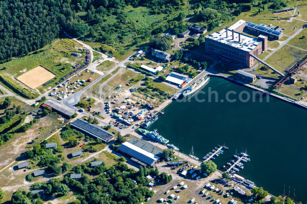 Aerial photograph Peenemünde - Reflecting water in the marina with sports boat moorings and boat berths on the Peenemuende shore area in Peenemuende on the island of Usedom in the state Mecklenburg - Western Pomerania, Germany.a