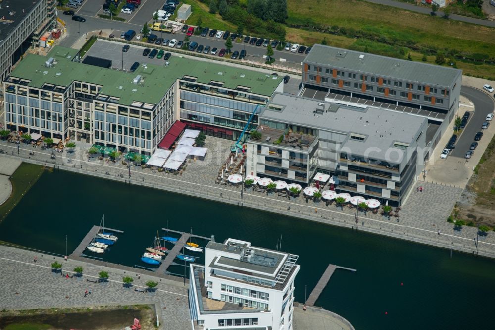 Dortmund from the bird's eye view: Pleasure boat marina with docks and moorings on the shore area of Phoenixsee in Dortmund in the state North Rhine-Westphalia