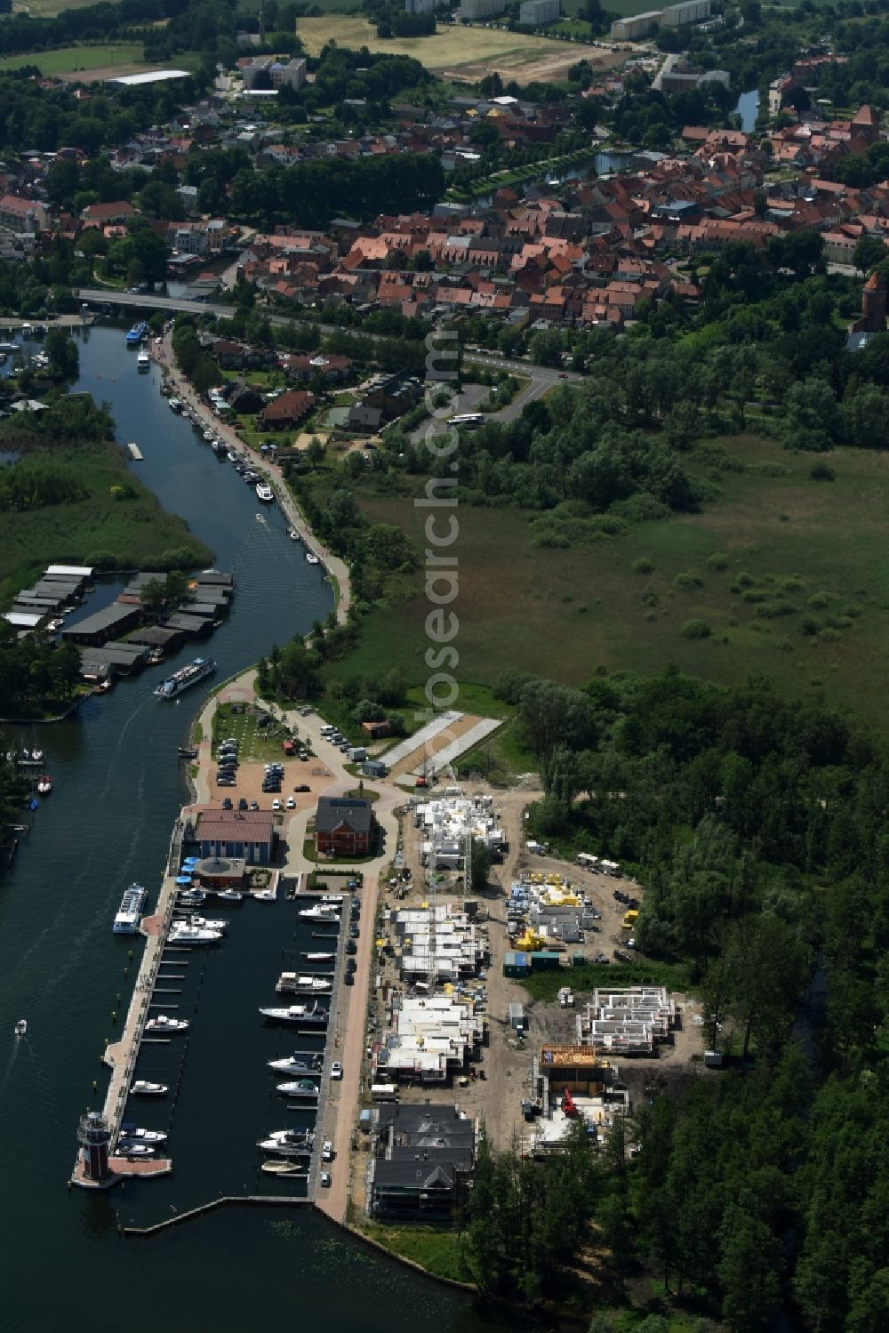 Plau am See from the bird's eye view: Pleasure boat marina with docks and moorings on the shore area of Plauer See in Plau am See in the state Mecklenburg - Western Pomerania