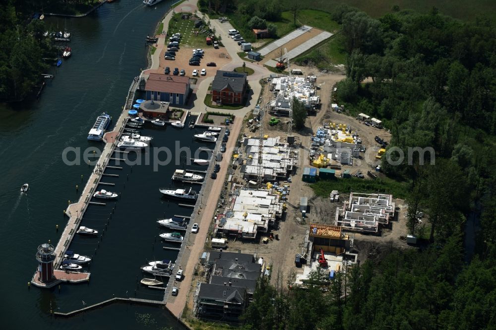 Aerial image Plau am See - Pleasure boat marina with docks and moorings on the shore area of Plauer See in Plau am See in the state Mecklenburg - Western Pomerania