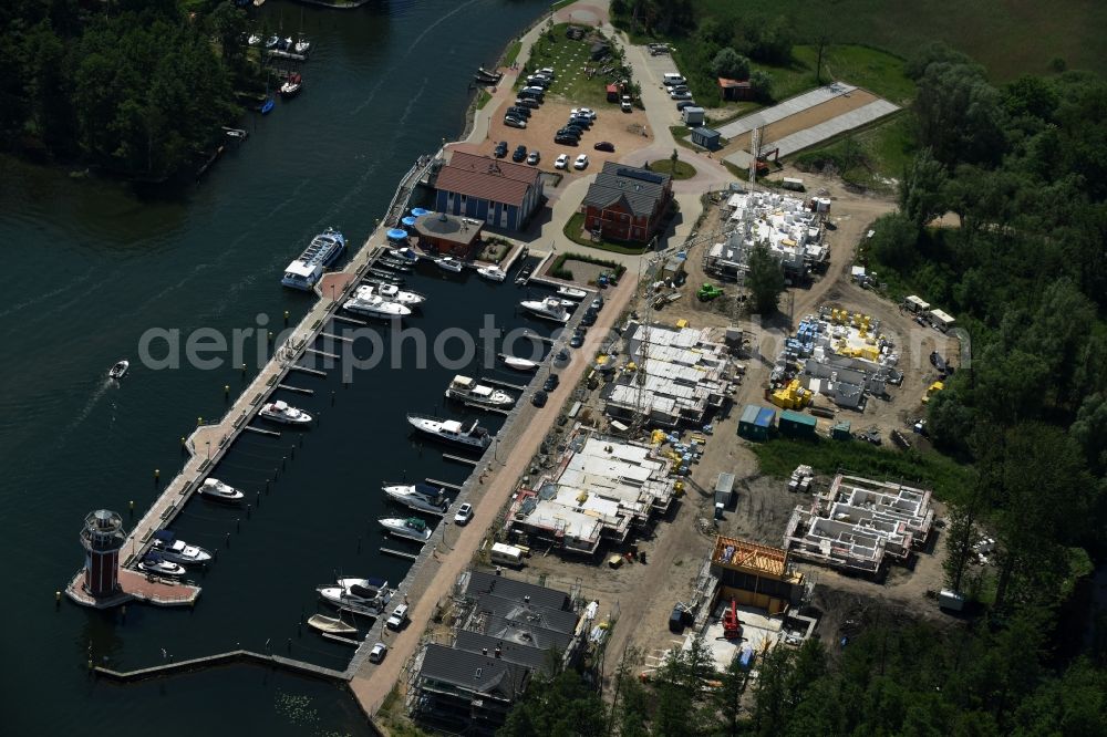 Aerial photograph Plau am See - Pleasure boat marina with docks and moorings on the shore area of Plauer See in Plau am See in the state Mecklenburg - Western Pomerania