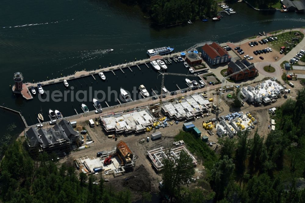 Plau am See from above - Pleasure boat marina with docks and moorings on the shore area of Plauer See in Plau am See in the state Mecklenburg - Western Pomerania