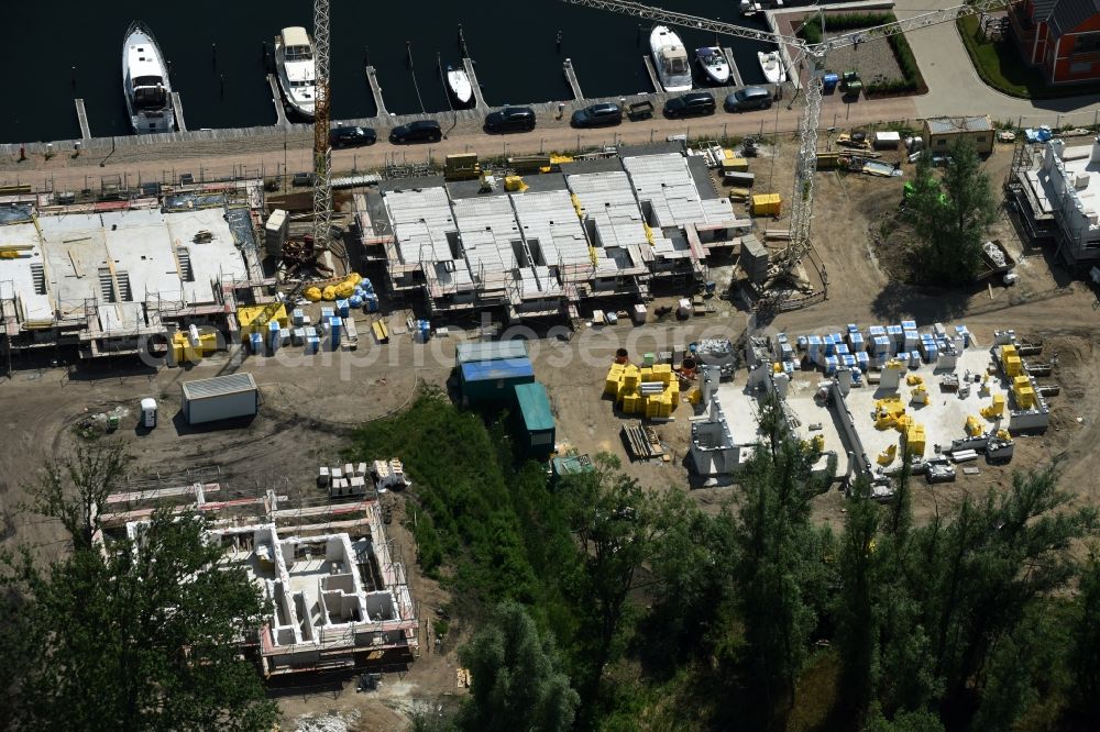 Aerial photograph Plau am See - Pleasure boat marina with docks and moorings on the shore area of Plauer See in Plau am See in the state Mecklenburg - Western Pomerania