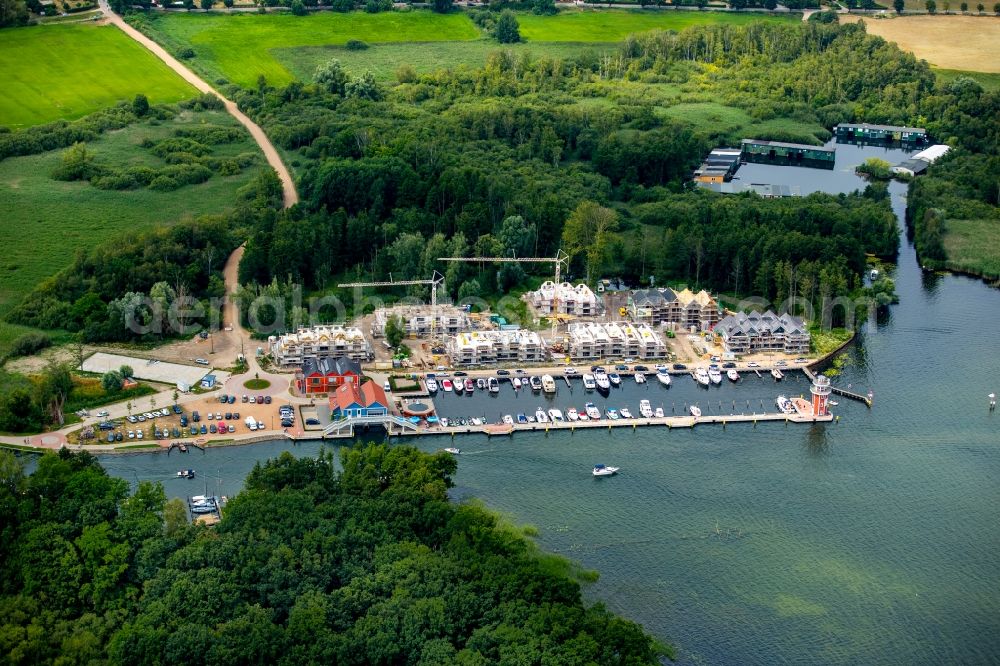 Aerial image Plau am See - Pleasure boat marina with docks and moorings on the shore area of Plauer See in Plau am See in the state Mecklenburg - Western Pomerania