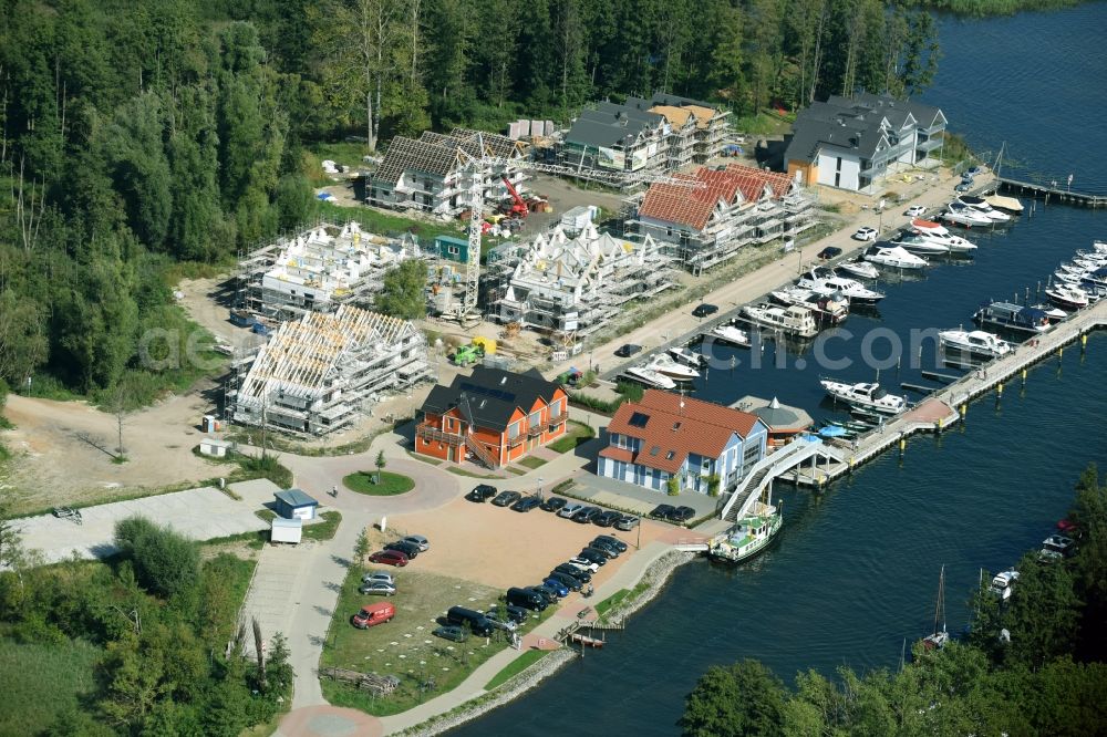 Plau am See from above - Pleasure boat marina with docks and moorings on the shore area of Plauer See in Plau am See in the state Mecklenburg - Western Pomerania