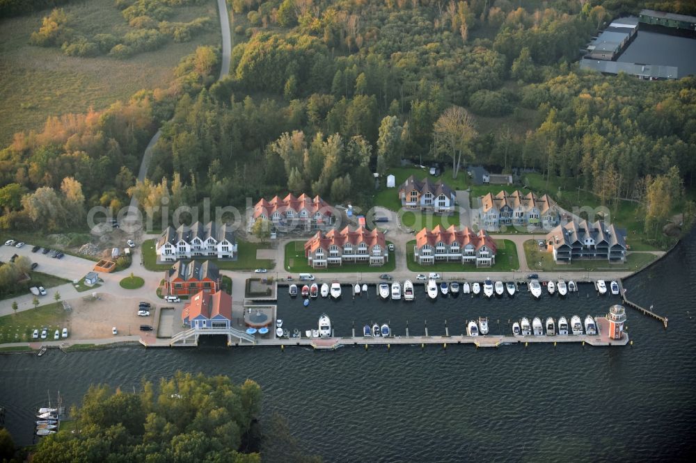 Plau am See from the bird's eye view: Pleasure boat marina with docks and moorings on the shore area of Plauer See in Plau am See in the state Mecklenburg - Western Pomerania