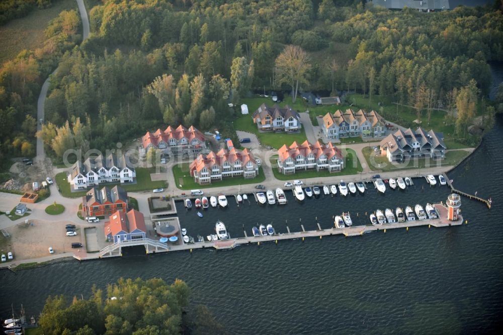 Aerial photograph Plau am See - Pleasure boat marina with docks and moorings on the shore area of Plauer See in Plau am See in the state Mecklenburg - Western Pomerania