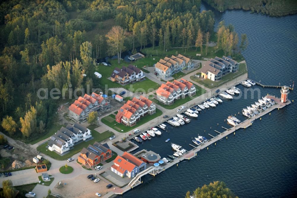 Plau am See from the bird's eye view: Pleasure boat marina with docks and moorings on the shore area of Plauer See in Plau am See in the state Mecklenburg - Western Pomerania