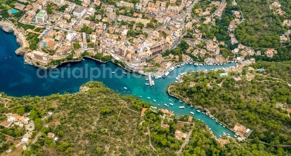 Santanyi from above - Pleasure boat marina with docks and moorings on the shore area Port de Cala Figuera in Santanyi in Balearische Insel Mallorca, Spain