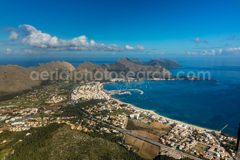 Port de Pollenca from the bird's eye view: Pleasure boat marina with docks and moorings on the shore area in Port de Pollenca in Balearische Insel Mallorca, Spain